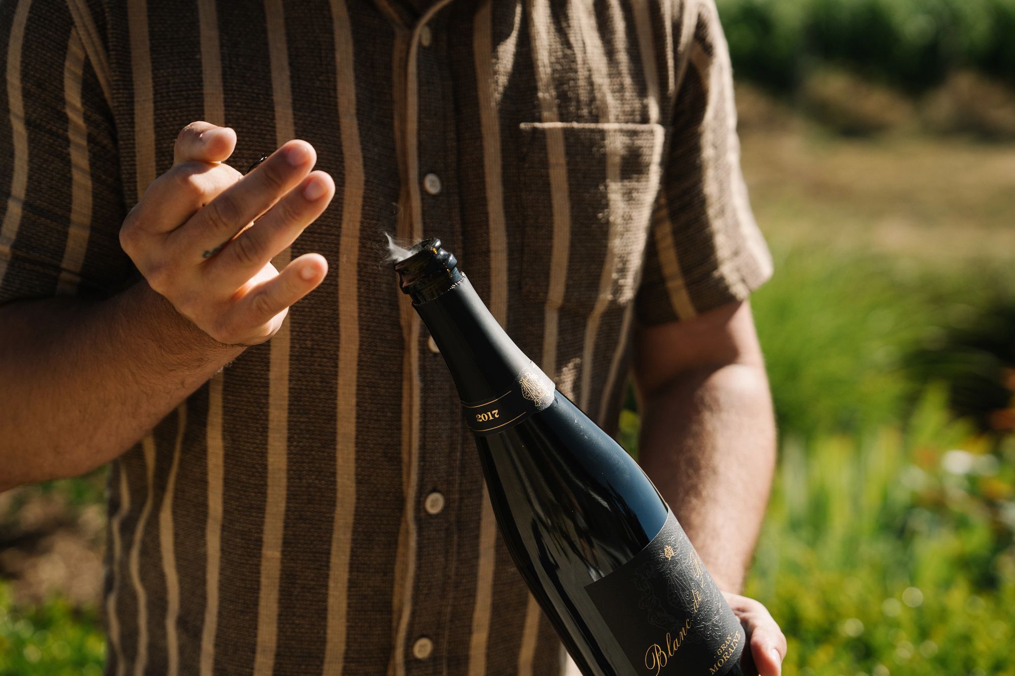 Blanc de Blancs sparkling wine being opened