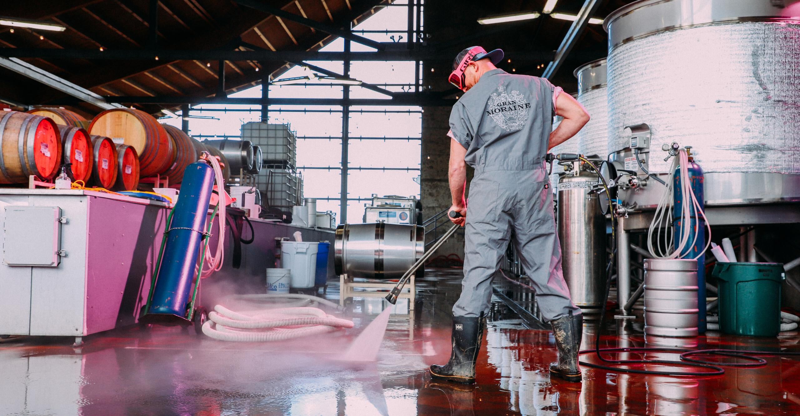 Man spraying water in the cellar